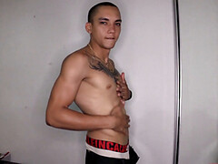 After stripping to his underwear, Kayser kicks back on a bed, revealing a monster cock. He quickly gets hard and starts jerking off.