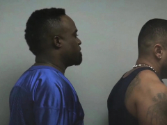 Black suspects are being identified in the police station.