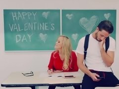 A blonde with large tits is fucked in the classroom hard