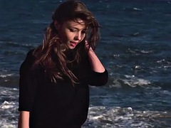 Ukrainian girl with big tits strips