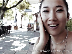 Asian cutie is blowing a complete stranger at the beach