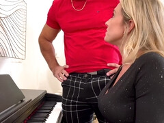 Schoolgirl Drills Lecturer During Piano Lesson
