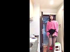 Asian Ladyboy jerking her man sausage displaying it to a woman