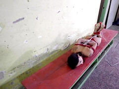 Freya Dee is bound with ropes and stimulated with a Hitachi