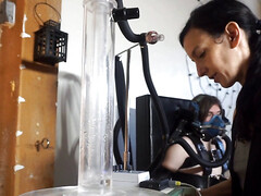 Tied up gimp is tortured by a perverted brunette mistress