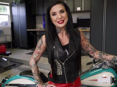 Winsome tattooed experienced woman Joanna Angel receiving a cumshot