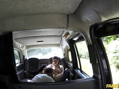 Horny couple get it on in rear of cab