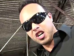 Brunette tranny in fishnet lingerie gets dominated while