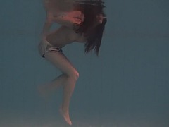 Beautiful girl with exquisite body Natalya Kupala swims naked