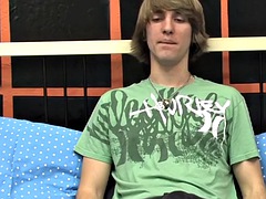 Dominic Depp enjoys an interview before caressing a young boy