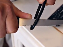 Nicole starts rubbing his cock with her foot