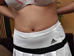 Busty redhead ladyboy in white fishnet stockings masturbates