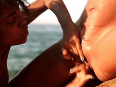 Luna Corazon and Cecilia Scott make love on the beach