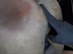 Strapon milking with latex gloves
