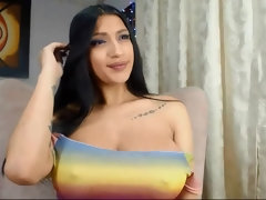 Latina babe with huge melons - webcam solo