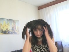 Hairy housewife stripping and feeling naughty