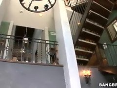 Julia Ann, the busty blonde MILF, pleasures herself on a glass table with a dildo