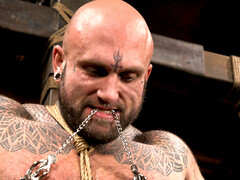 Tied up guy is flogged and tortured by kinky girls