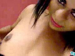 Tattooed petite she-creature jerks her dark-hued cock