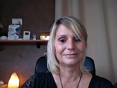 MILF with big boobs masturbates with her dildo