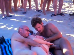 Voyeur Guy wanking and fuck redhead girl on a public beach