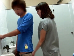 Watch MILF Riho Mikami gag on a hard dick in a public restroom