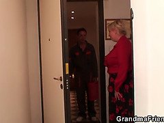 Two repairmen fuck busty grandma