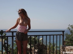 Sexy teen rubbing her clit at the beach