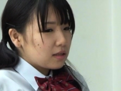 Japanese schoolgirl fucks her unshaved pussy with toy
