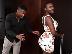 Almost bald busty ebony Zaawaadi jumps on a hard brown penis