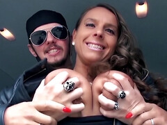 Horny man squeezes babes massive tits and fucks her in the car