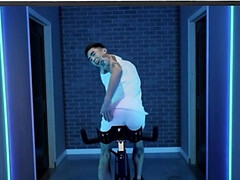 Muscular fellows with tattoos are riding bike and cocks