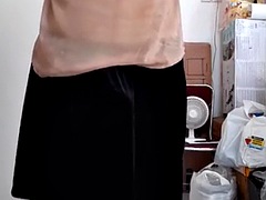 Sweating and cumming in a womans blouse and satin velvet skirt