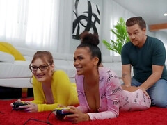 Interracial threesome makes the girls forget about video game