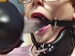 Femboy face fucked by a machine