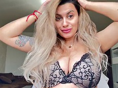 Hot blonde beauty with big boobs face cream play on big natural boobs